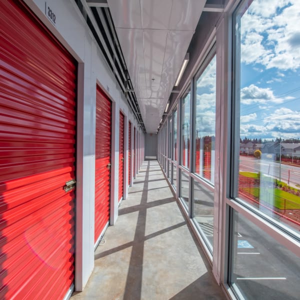 Interior units with bright doors at StorQuest Self Storage in Hillsboro, Oregon