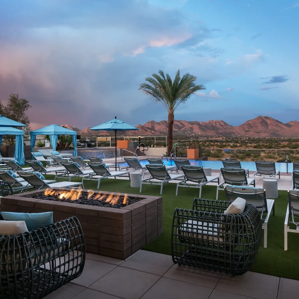 Beautiful fire and poolside seating at The Halsten at Chauncey Lane in Scottsdale, Arizona