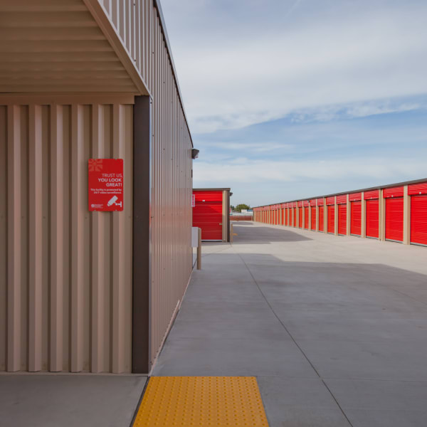Outdoor storage units with bright doors at StorQuest Express Self Service Storage in Sacramento, California