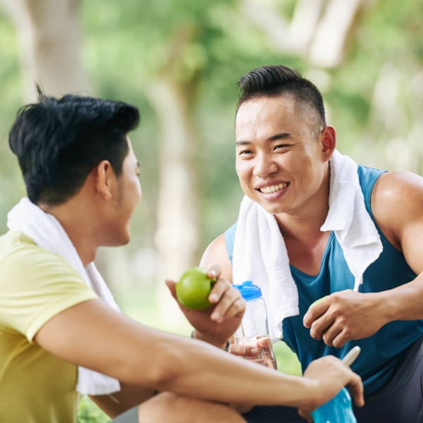 Residents chatting after their workout at Highland View Court in Bakersfield, California