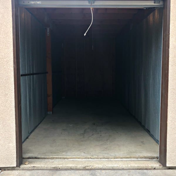 An open storage unit at StorQuest Self Storage in Arvada, Colorado