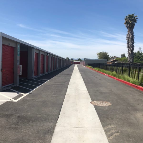 Red doors on outdoor units at StorQuest Self Storage in San Jose, California
