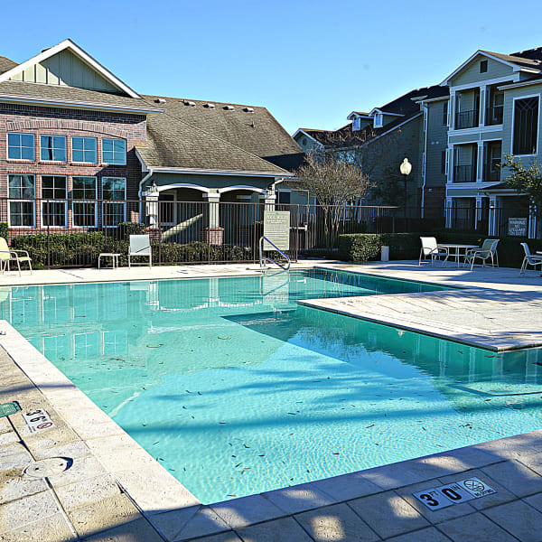 Resort-style swimming pool at Parc Place Apartment Homes in Chalmette, Louisiana