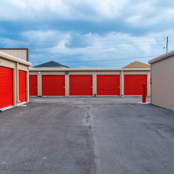 Outdoor storage units with bright doors at StorQuest Express Self Service Storage in Sacramento, California