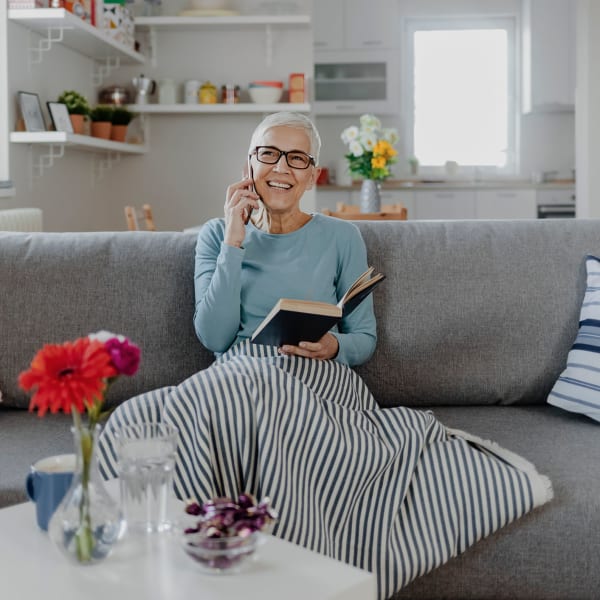 A resident on the phone with Kenmore Senior Living in Kenmore, Washington.