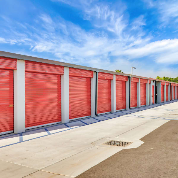 Outdoor storage units with bright doors at StorQuest Self Storage in Reno, Nevada