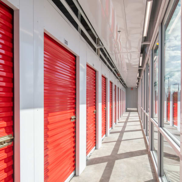 Red doors on indoor units at StorQuest Self Storage in La Quinta, California