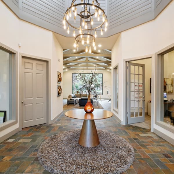 Main entrance to the clubhouse and leasing office at River Pointe in Conroe, Texas
