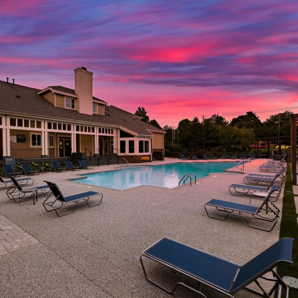 Swimming pool with lounge chair at Butternut Ridge Apartments in North Olmsted, Ohio