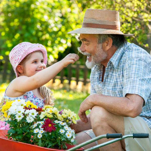 Resident and granddaughter in the garden at Pacifica Senior Living Spring Valley in Las Vegas, Nevada. 