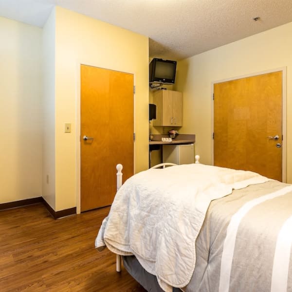Resident bedroom at Pacifica Senior Living Heritage Hills in Hendersonville, North Carolina