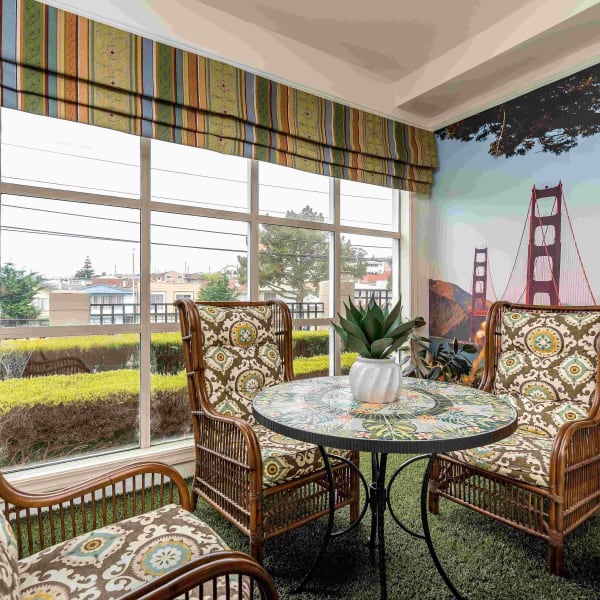 Round dining table at Pacifica Senior Living Mission Villa in Daly City, California