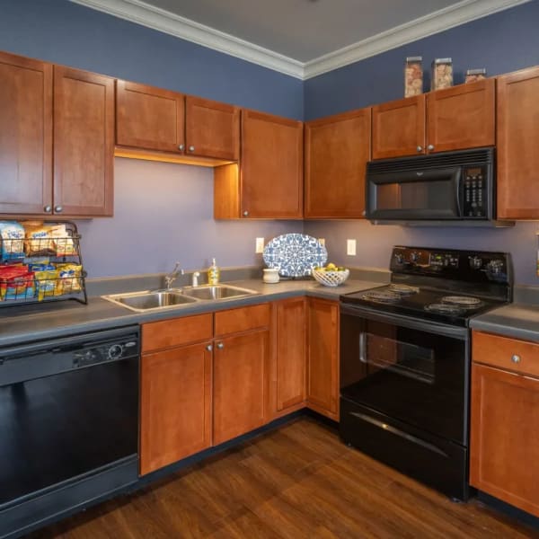 Kitchen with black appliance at CityView in North Kansas City, Missouri