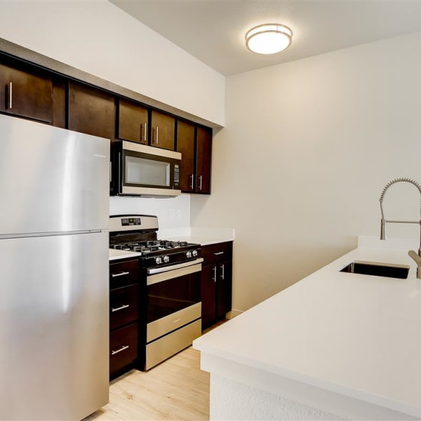 Spacious kitchen with microwave at The Palms at Morada in Stockton, California