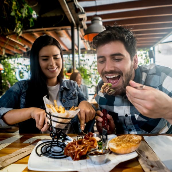 Couple getting a bite eat near Revel Ballpark in Atlanta, Georgia