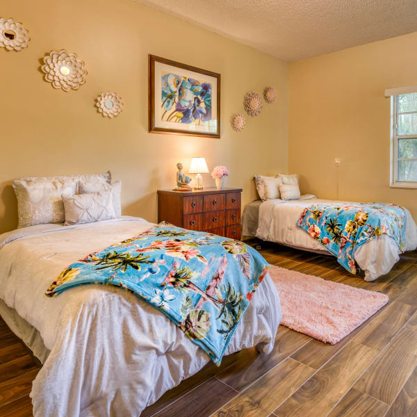 Bed room at Pacifica Senior Living Sunrise in Sunrise, Florida. 