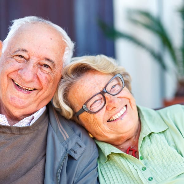 Senior Couple Sitting outside at Vernon Terrace of Edina in Edina, Minnesota