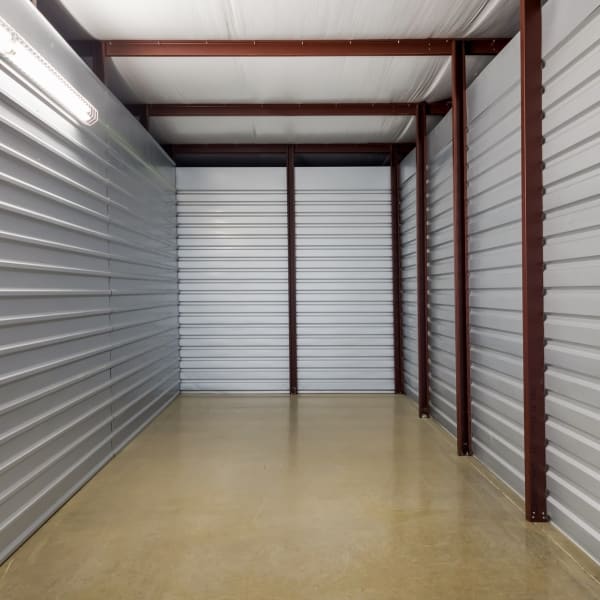 Inside a climate controlled interior storage unit at StorQuest Self Storage in Kyle, Texas