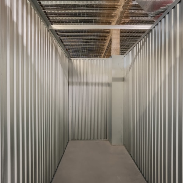 Inside a small climate-controlled storage unit at StorQuest Self Storage in Miami, Florida