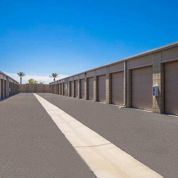 Outdoor drive-up storage units at StorQuest Self Storage in Sun City, Arizona