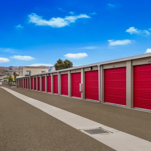 Red doors on outdoor units at StorQuest Self Storage in San Jose, California