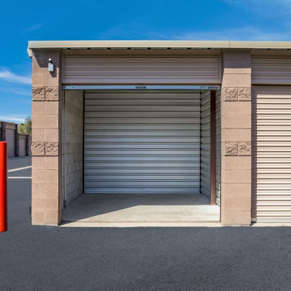 An open outdoor drive-up storage unit at StorQuest Self Storage in Glendale, Arizona