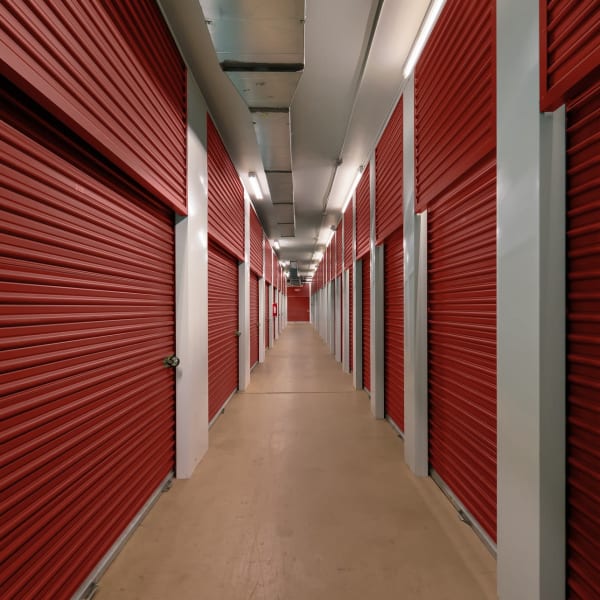 Red doors on indoor units at StorQuest Economy Self Storage in Worthington, Ohio