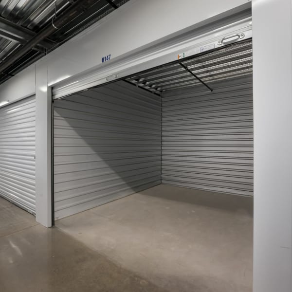 A large, open, climate-controlled storage unit at StorQuest Self Storage in Reno, Nevada