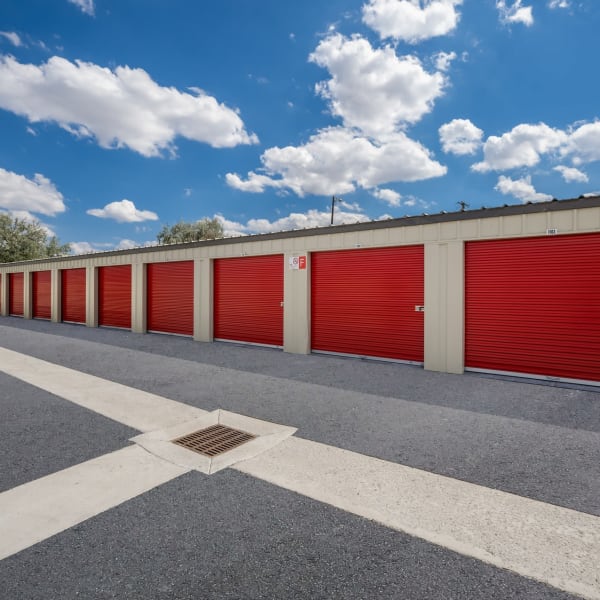 Outdoor storage units with bright doors at StorQuest Self Storage in Reno, Nevada