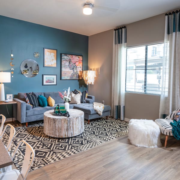 Well decorated room with wood-inspired flooring at Brix Warehouse District in Phoenix, Arizona 