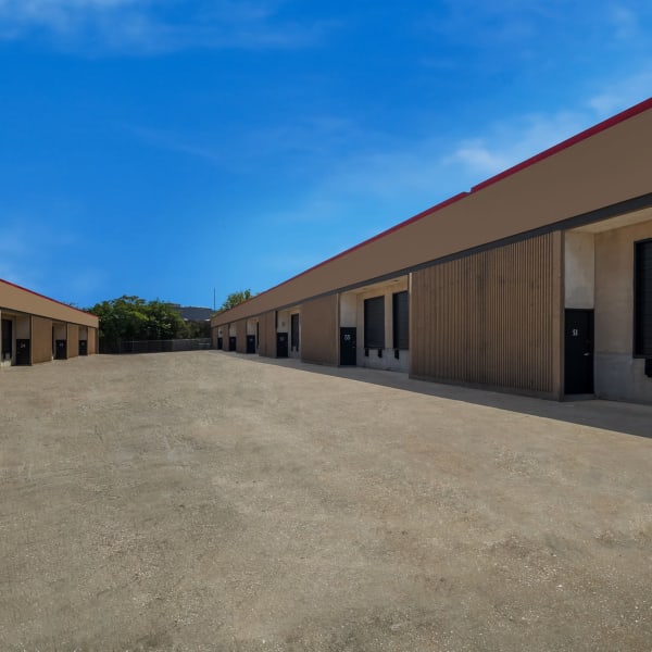 Outdoor units and wide drive aisles at StorQuest Economy Self Storage in Dallas, Texas