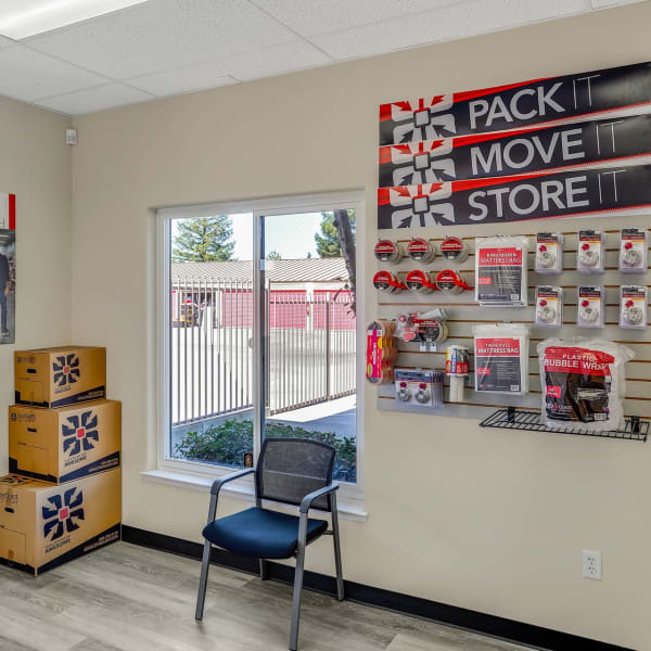 Interior of the leasing office with packing supplies available at StorQuest Self Storage in Stockton, California