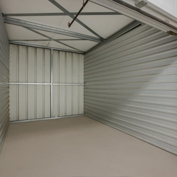 Inside a large climate-controlled storage unit at StorQuest Self Storage in San Bernardino, California