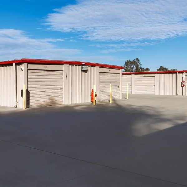 Outdoor drive-up storage units at StorQuest Self Storage in Ceres, California