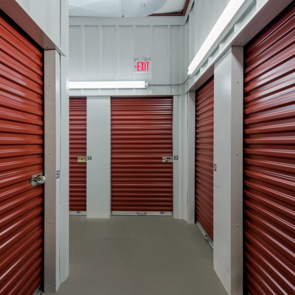 Red doors on indoor units at StorQuest Economy Self Storage in Kansas City, Missouri