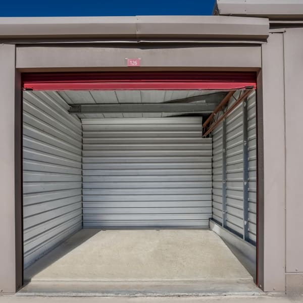 An open outdoor storage unit at StorQuest Self Storage in Gainesville, Florida