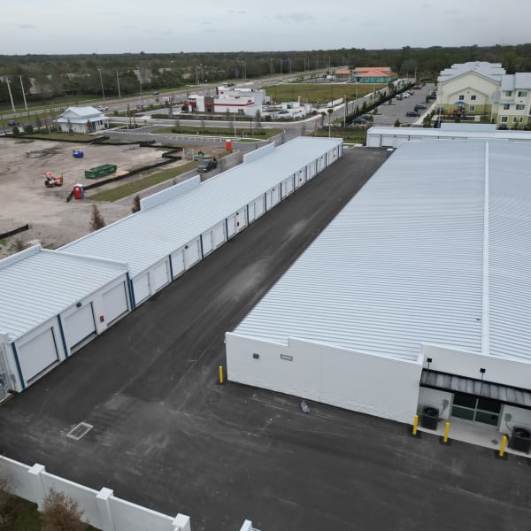 A row of drive-up storage units at StorQuest Self Storage in Parrish, Florida