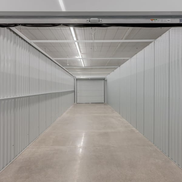 Inside a large indoor storage unit at StorQuest Self Storage in Reno, Nevada