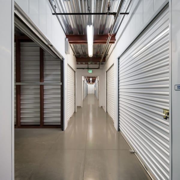 White doors on indoor storage units at StorQuest Self Storage in Woodland Hills, California