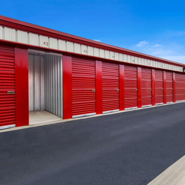 Outdoor storage units with bright doors at StorQuest Self Storage in Bakersfield, California