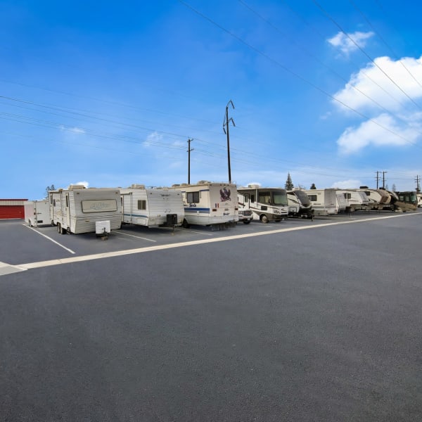 RVs and trailers parked at StorQuest Self Storage in Bakersfield, California