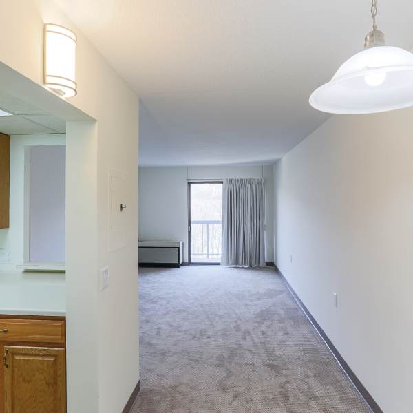 Living room and pass-through to the kitchen of a model apartment at Coraopolis Towers in Coraopolis, Pennsylvania
