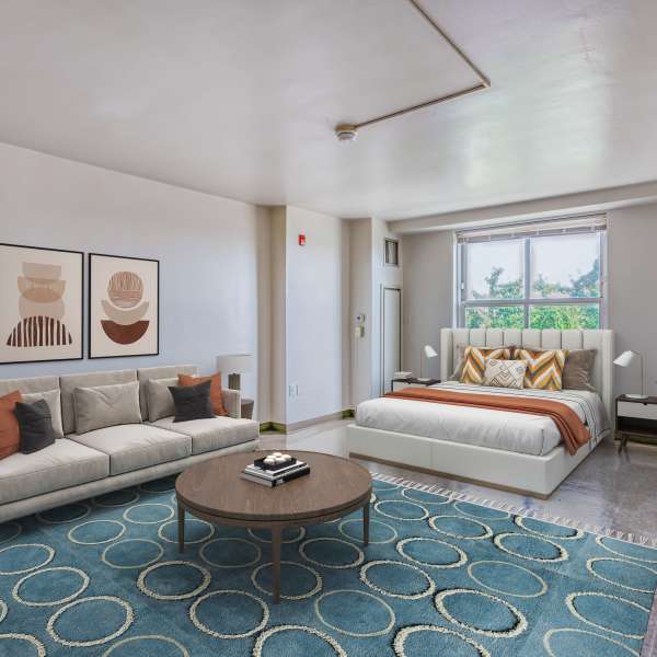 Living/Bedroom space of a studio apartment at Guild House East in Philadelphia, Pennsylvania