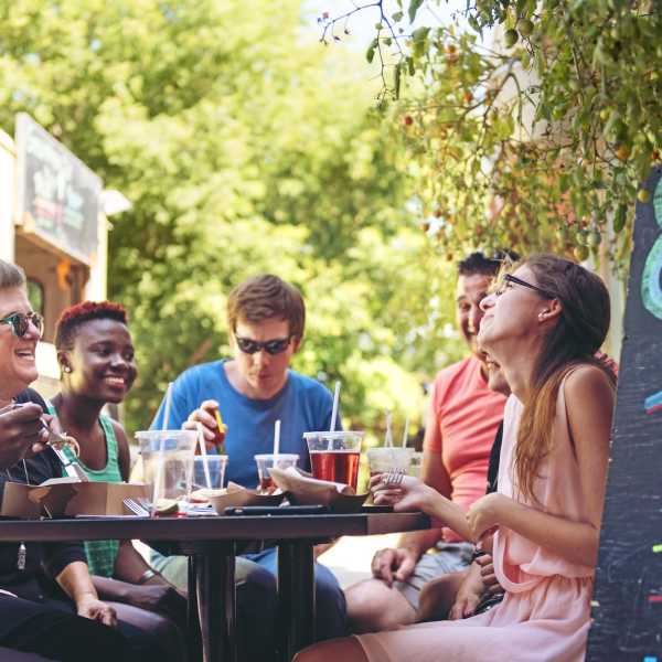 Woman hanging out with friends at lunch The Abbey at Briargrove Park in Houston,Texas