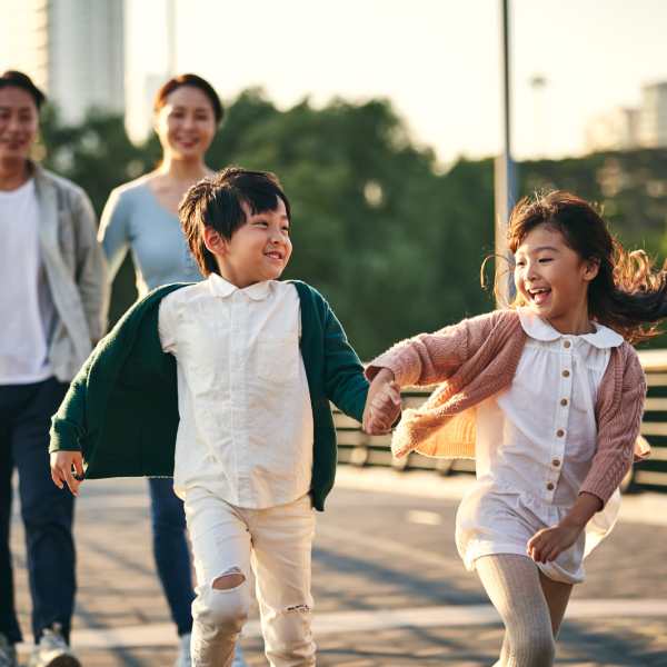 Father and child playing soccer at The Residences at Hamilton Lakes in Itasca, IL
