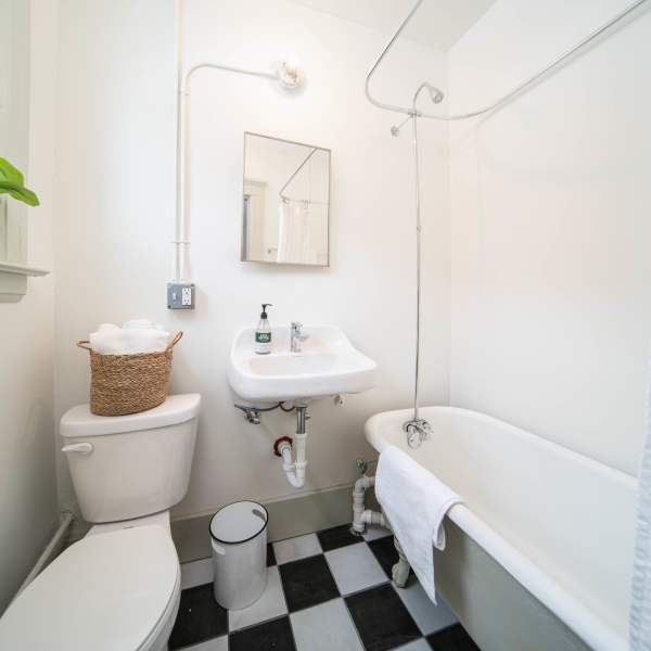 Bathroom with bathtub at Detroit Living in Detroit, Michigan