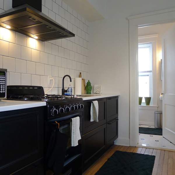 Apartment kitchen with black appliances at Detroit Living in Detroit,Michigan