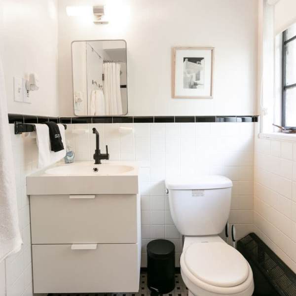 Bathroom with mirror at Detroit Living in Detroit, Michigan