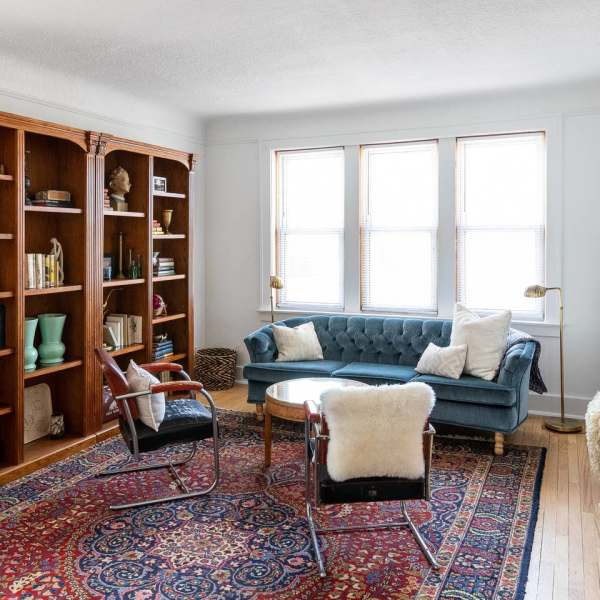 Living room with couch at Detroit Living in Detroit, Michigan