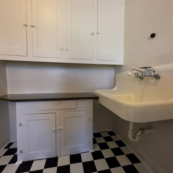 Laundry room at Detroit Living in Detroit, Michigan